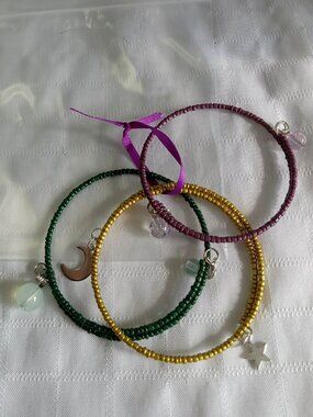 P - Handmade memory wire bracelets set with beads and pendants